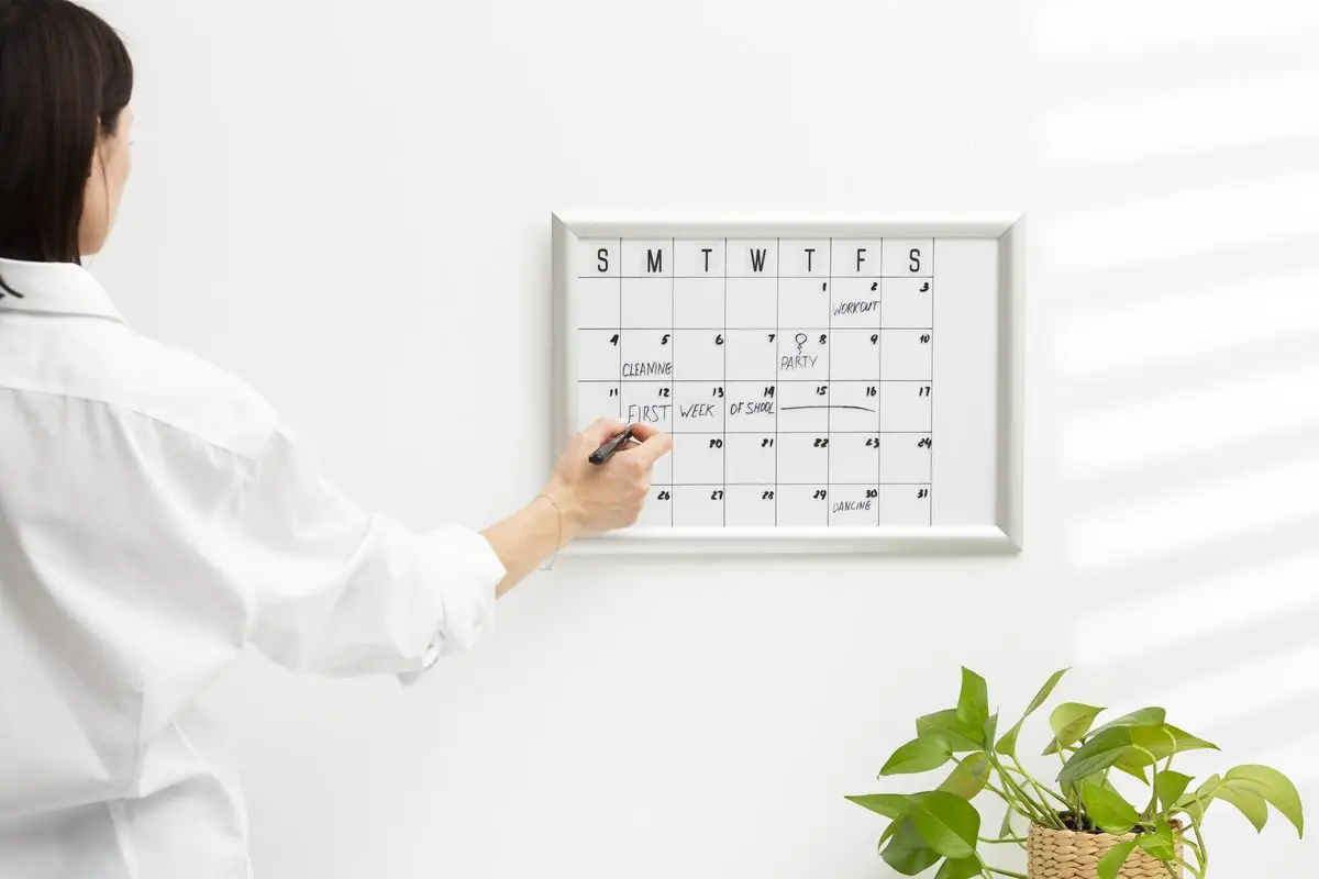 A family schedule being planned on a calendar